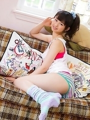 Rina Koike in socks and colorful bath suit is so playful
